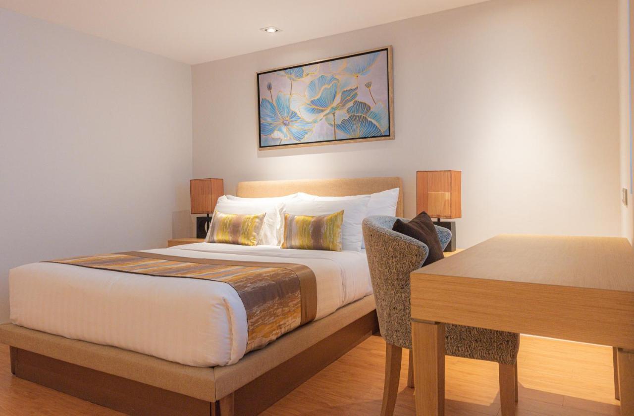 Summit Windmill Golf Suite Hotel At Suvarnabhumi Bangkok Exterior foto A bedroom at the hotel